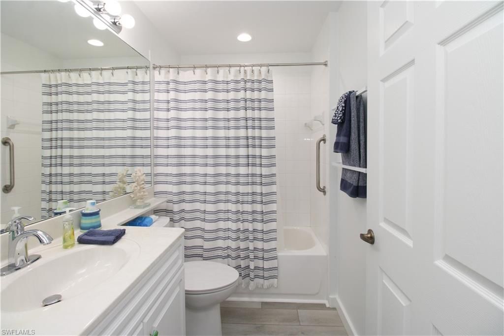25080 Peacock Ln, Unit 101, Naples, FL 34114 Photo