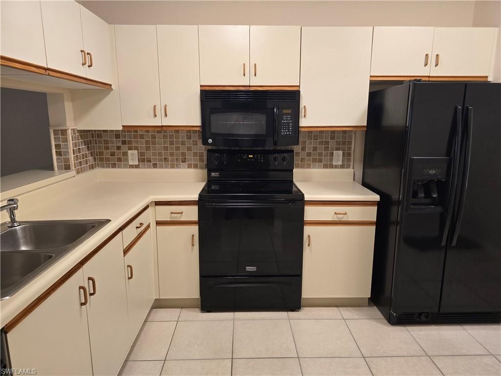 5750 Woodmere Lake Cir, Unit H101, Naples, FL 34112 Photo