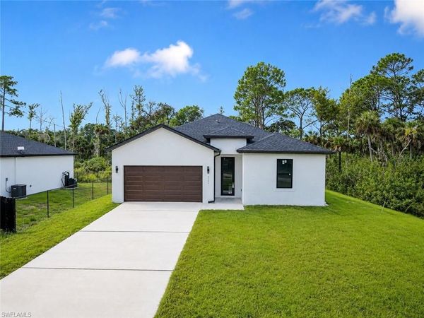 621 GREENBRIAR BLVD , LEHIGH ACRES, FL 33972