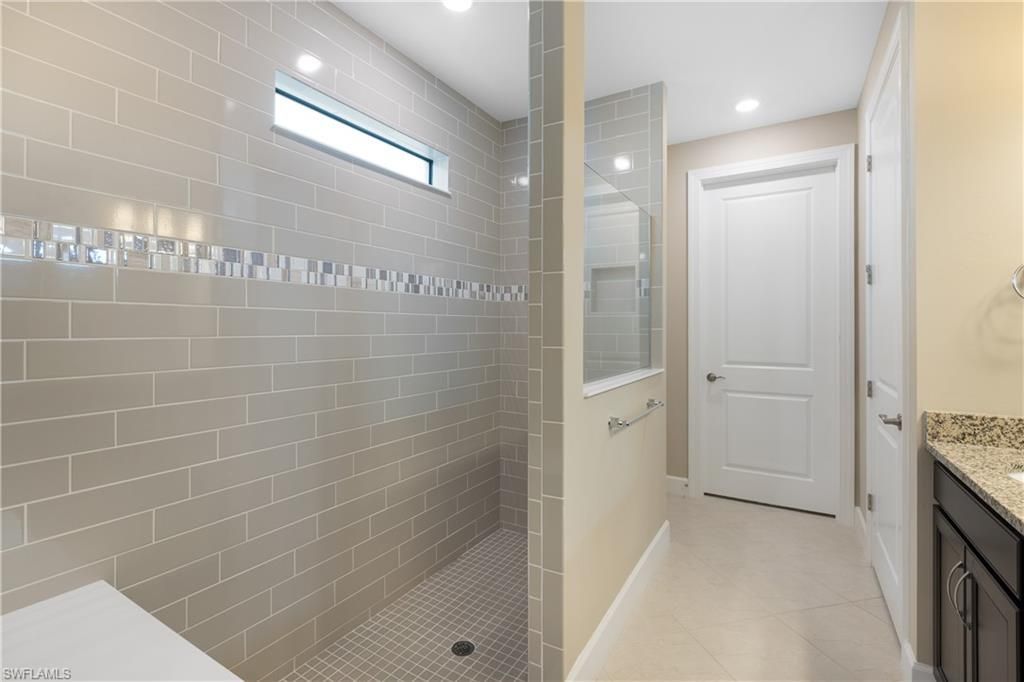 7700 Winding Cypress Dr, Naples, FL 34114 Photo