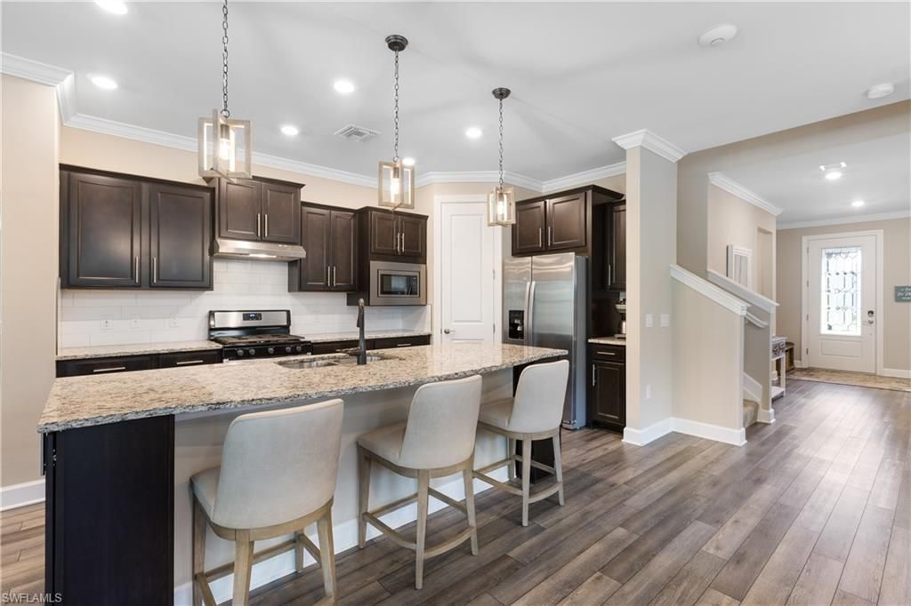 7700 Winding Cypress Dr, Naples, FL 34114 Photo