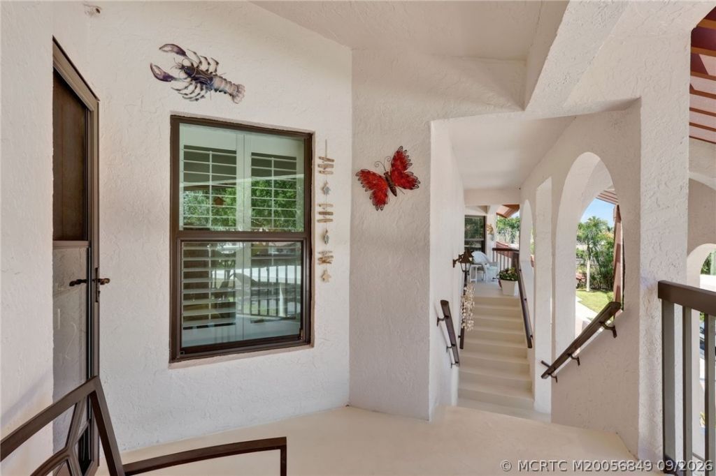 6011 SE Martinique Drive, Unit 201, Stuart, FL 34997 Photo