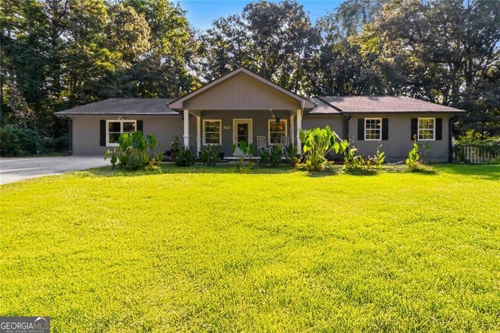 3290 Stonewall Tell Road, Atlanta, GA 30349 Main Photo