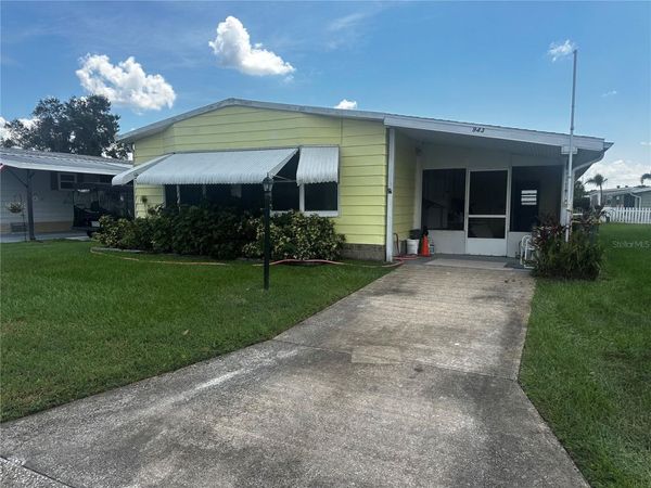943 JACARANDA DRIVE , BAREFOOT BAY, FL 32976