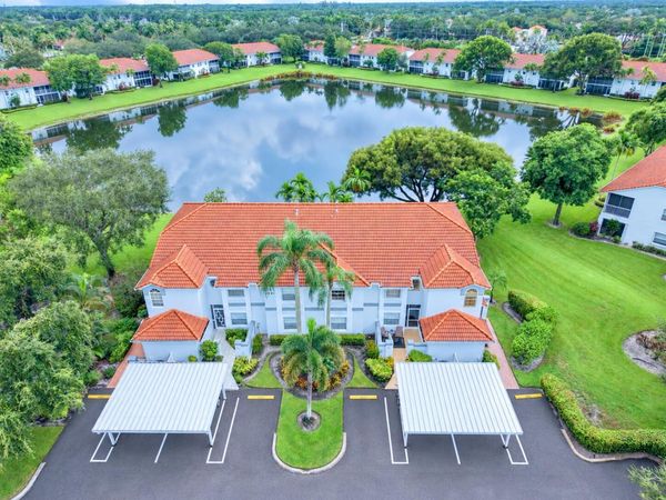 7881 WHISPERING PALMS Drive, Unit 202, Boynton Beach, FL 33437