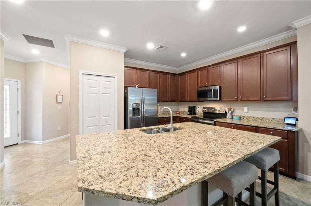 9086 Woodhurst Dr, Naples, FL 34120 Photo