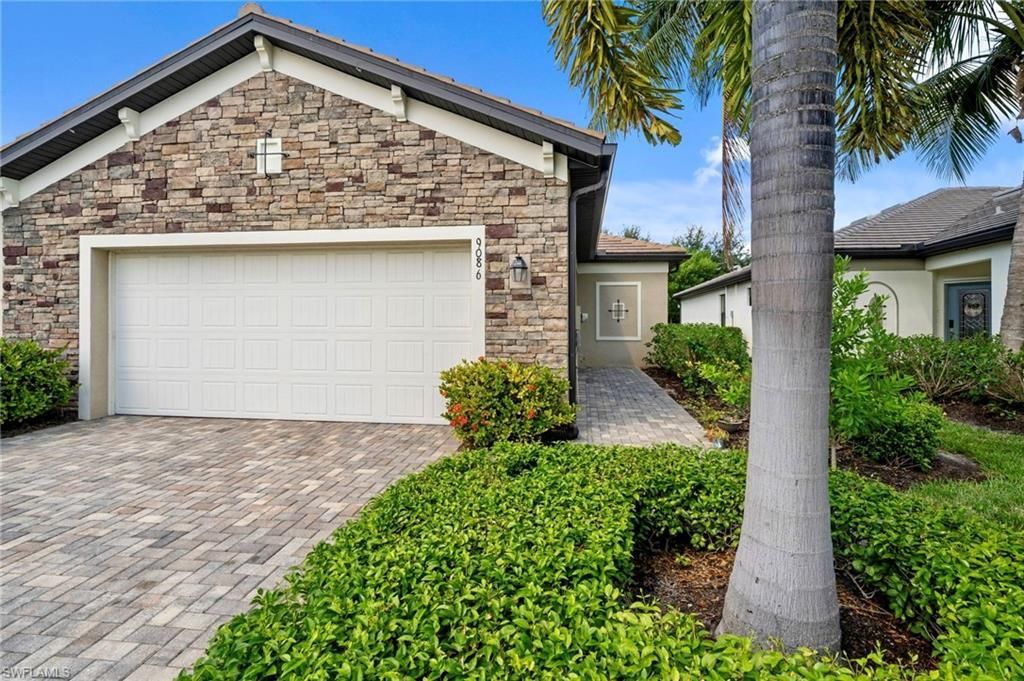9086 Woodhurst Dr, Naples, FL 34120 Photo