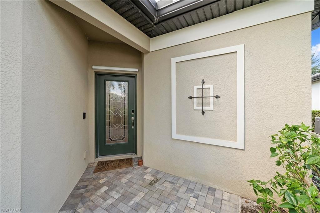 9086 Woodhurst Dr, Naples, FL 34120 Photo