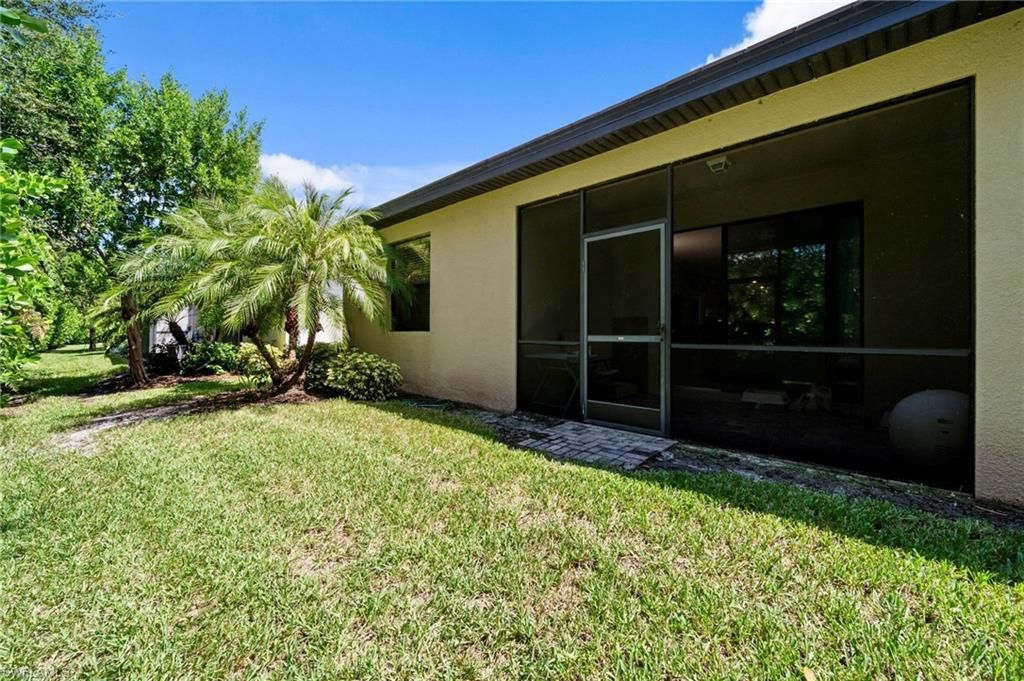 9086 Woodhurst Dr, Naples, FL 34120 Photo