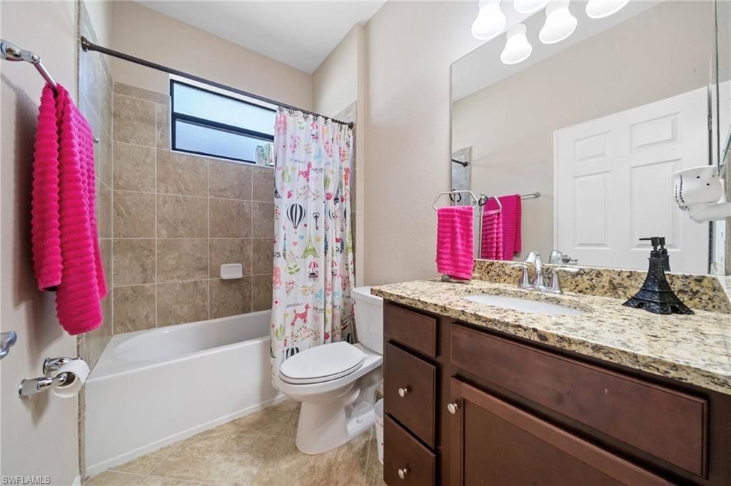 9086 Woodhurst Dr, Naples, FL 34120 Photo