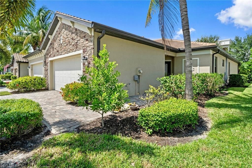 9086 Woodhurst Dr, Naples, FL 34120 Photo