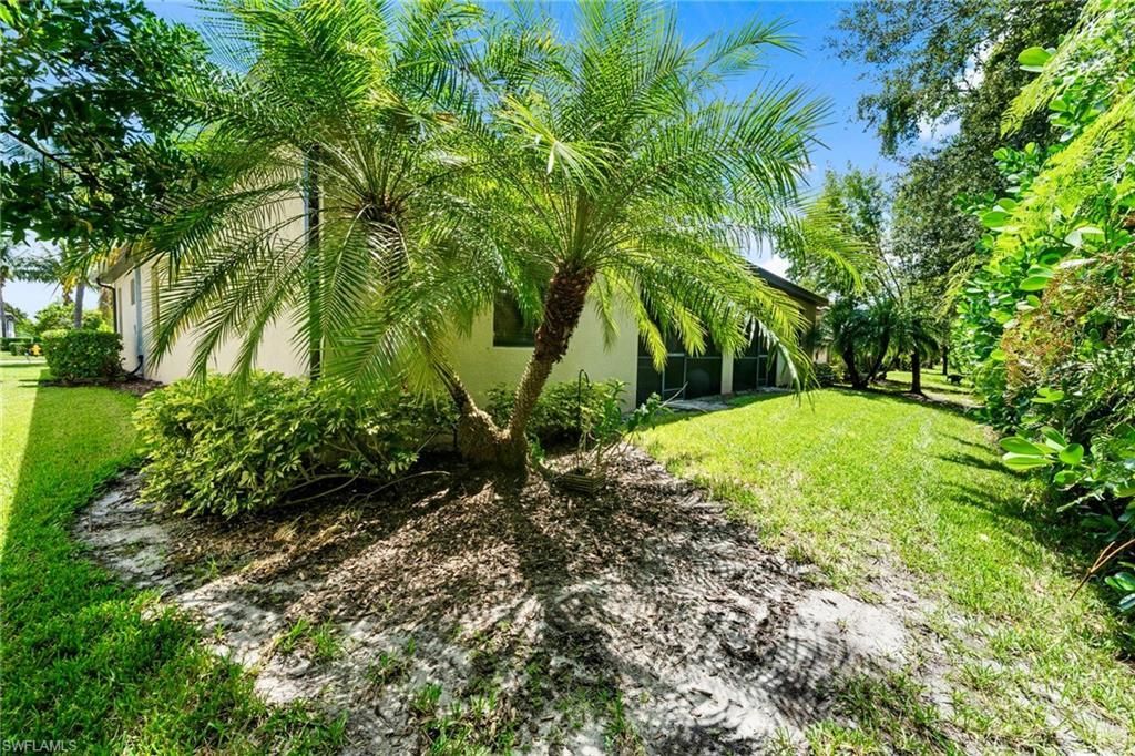 9086 Woodhurst Dr, Naples, FL 34120 Photo