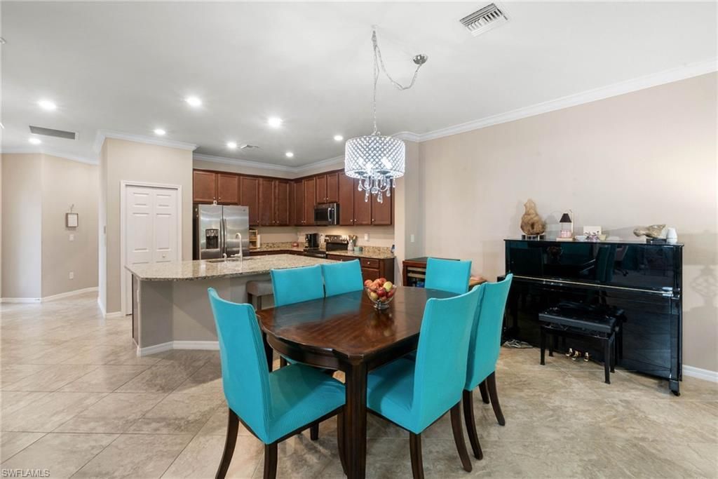 9086 Woodhurst Dr, Naples, FL 34120 Photo