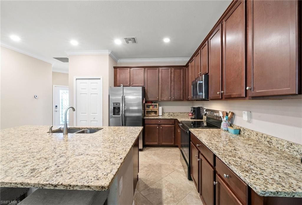 9086 Woodhurst Dr, Naples, FL 34120 Photo