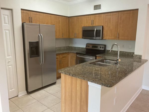 6505 Emerald Dunes Drive, Unit 204, West Palm Beach, FL 33411