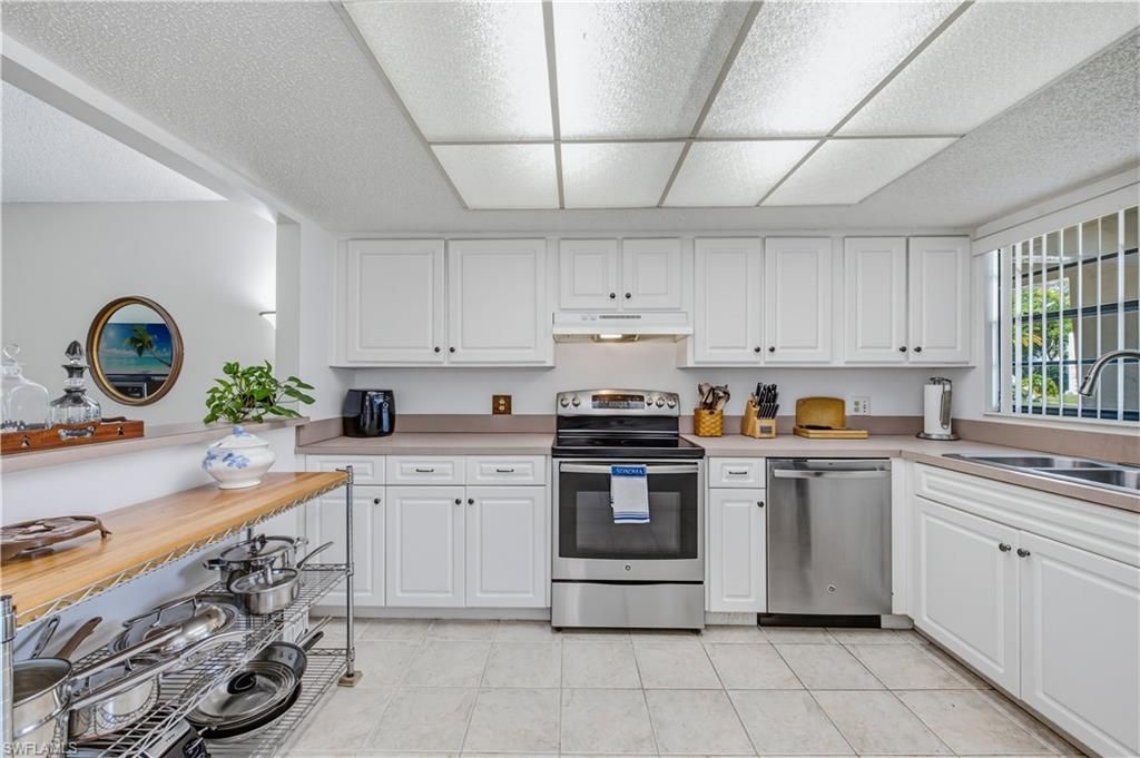 151 Cypress Way E, Unit C103, Naples, FL 34110 Photo