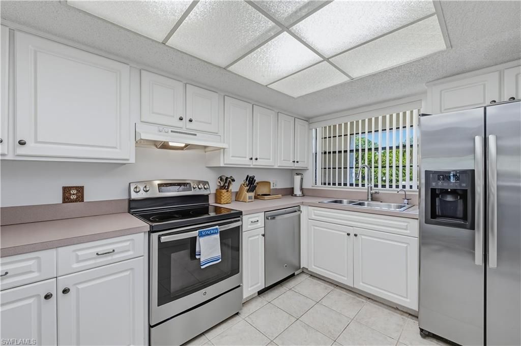 151 Cypress Way E, Unit C103, Naples, FL 34110 Photo