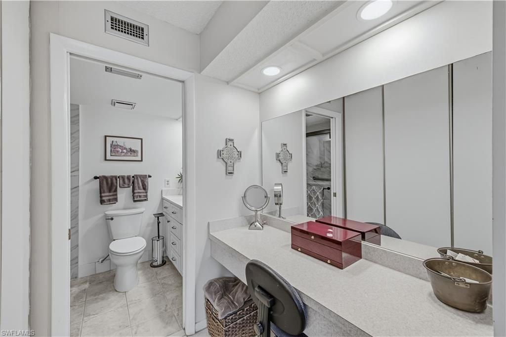 151 Cypress Way E, Unit C103, Naples, FL 34110 Photo