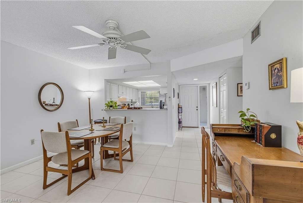 151 Cypress Way E, Unit C103, Naples, FL 34110 Photo