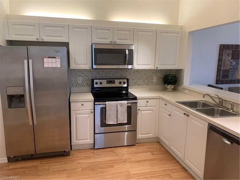 230 Robin Hood Cir, Unit 102, Naples, FL 34104 Photo