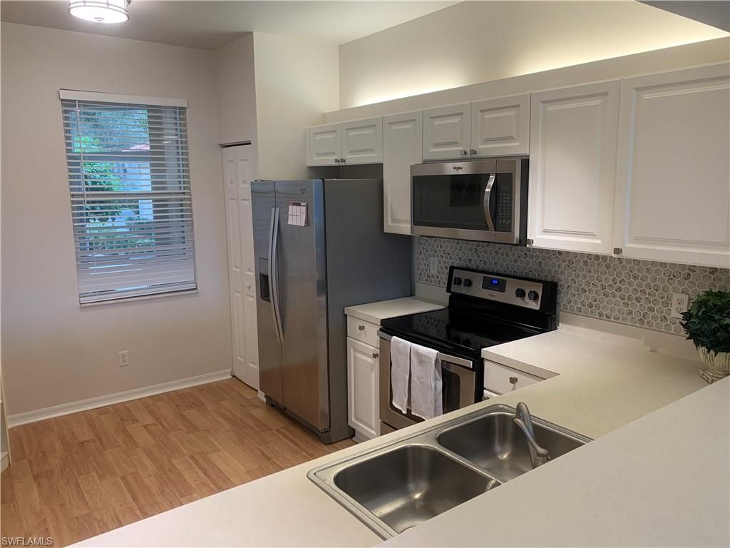 230 Robin Hood Cir, Unit 102, Naples, FL 34104 Photo