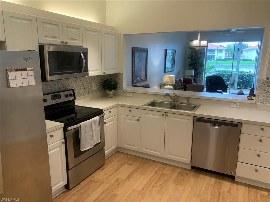 230 Robin Hood Cir, Unit 102, Naples, FL 34104 Photo