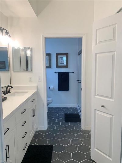 230 Robin Hood Cir, Unit 102, Naples, FL 34104 Photo
