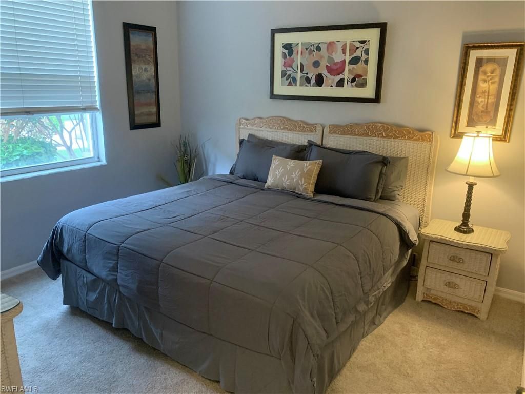 230 Robin Hood Cir, Unit 102, Naples, FL 34104 Photo