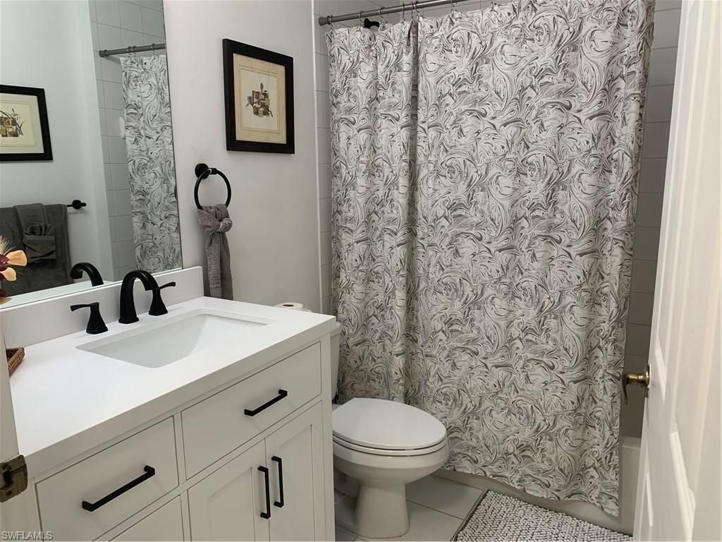 230 Robin Hood Cir, Unit 102, Naples, FL 34104 Photo
