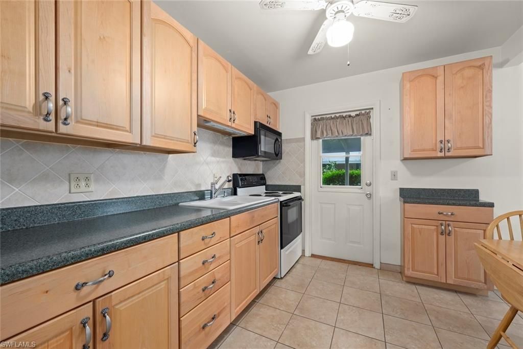 16 Dawn Flower Cir, Lehigh Acres, FL 33936 Photo
