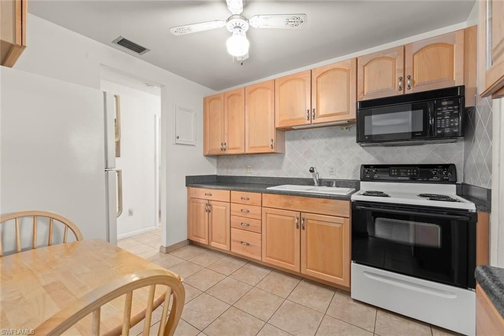 16 Dawn Flower Cir, Lehigh Acres, FL 33936 Photo