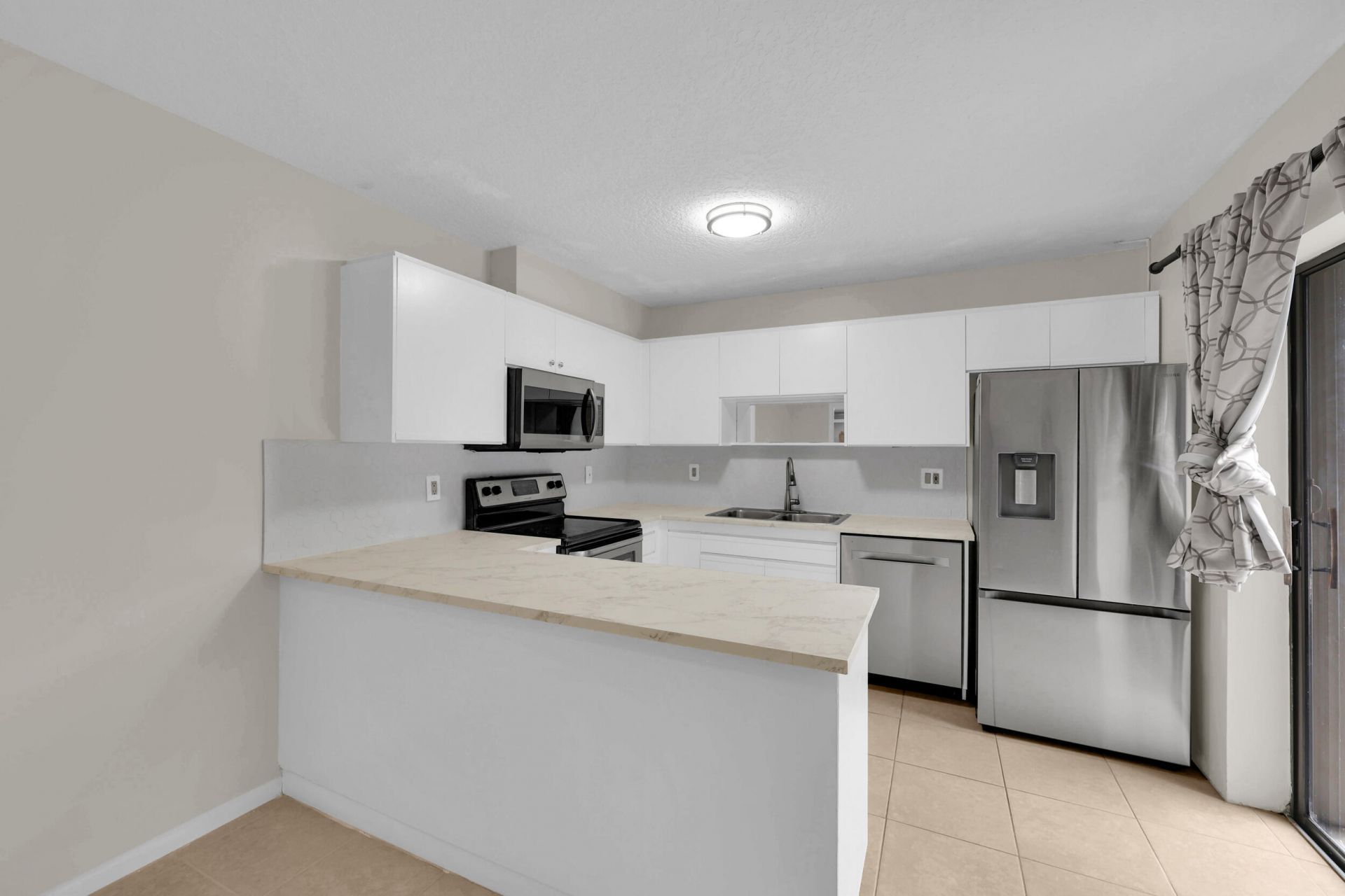 5857 SE Windsong Lane, Unit 806, Stuart, FL 34997 Photo