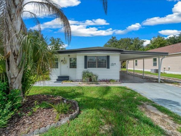 1314 TEAKWOOD LANE , LADY LAKE, FL 32159