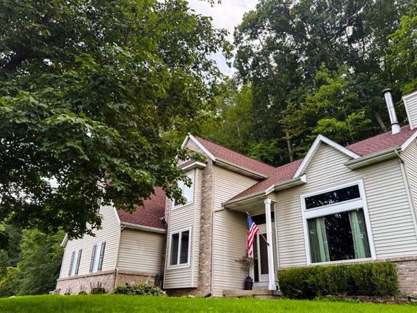 8824 Grand River Drive SE, Ada, MI 49301