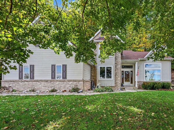 8824 Grand River Drive SE, Ada, MI 49301