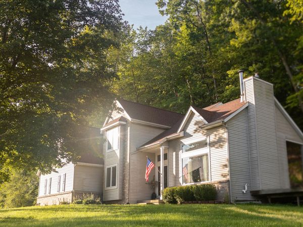 8824 Grand River Drive SE, Ada, MI 49301