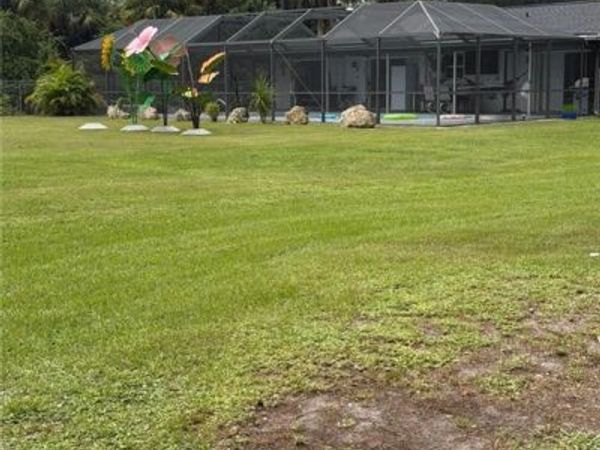 704 Cleveland AVE , LEHIGH ACRES, FL 33972