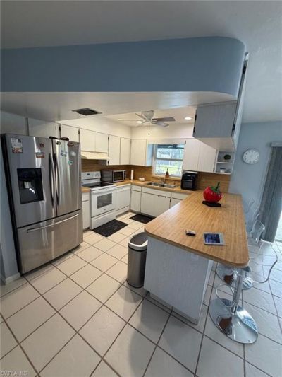 704 Cleveland Ave , Lehigh Acres, FL 33972 Photo