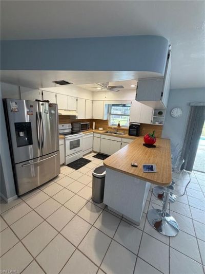 704 Cleveland Ave , Lehigh Acres, FL 33972 Photo
