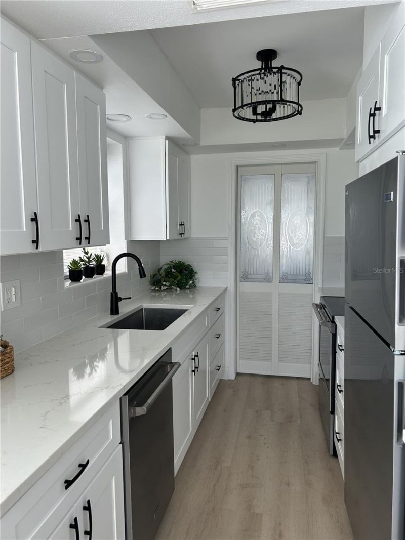 3808 Gulf Of Mexico Drive, Unit E111, Longboat Key, FL 34228 Photo