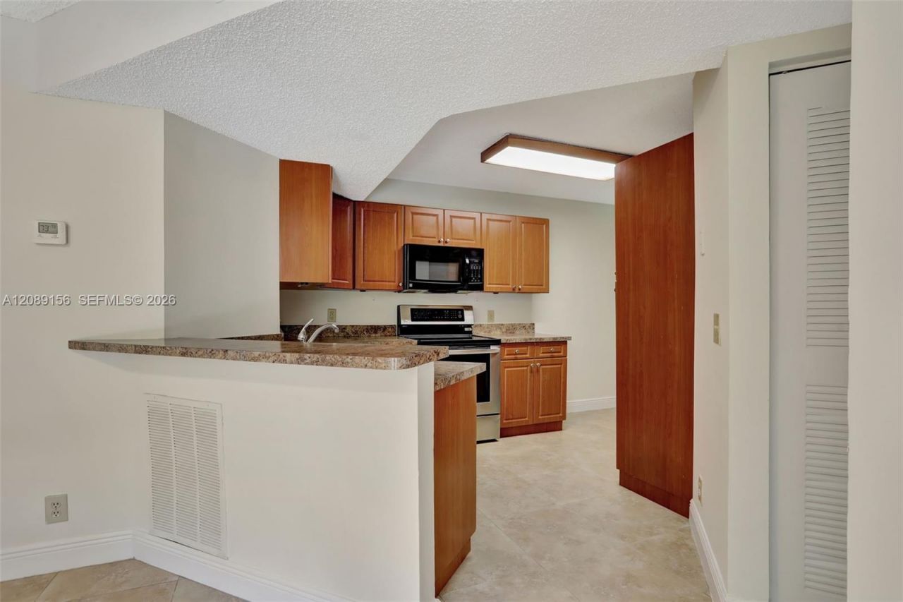8891 Wiles Rd, Unit 102, Coral Springs, FL 33067 Photo