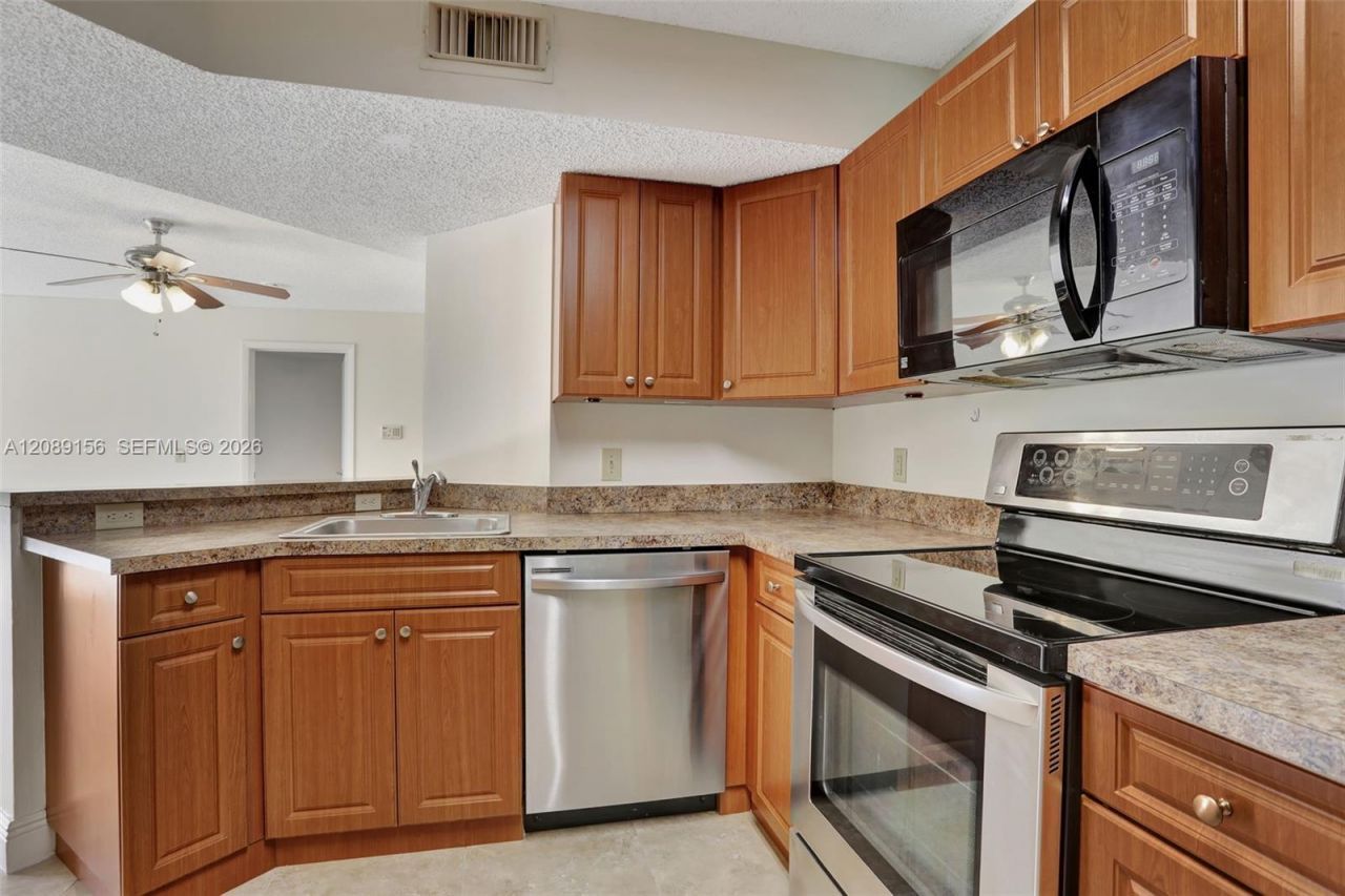 8891 Wiles Rd, Unit 102, Coral Springs, FL 33067 Photo