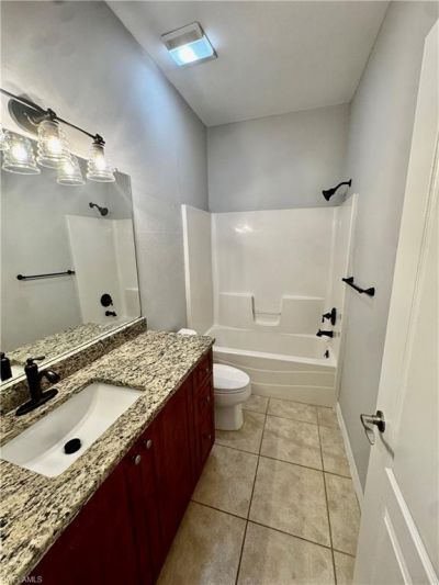1709 Moore Ave , Lehigh Acres, FL 33972 Photo
