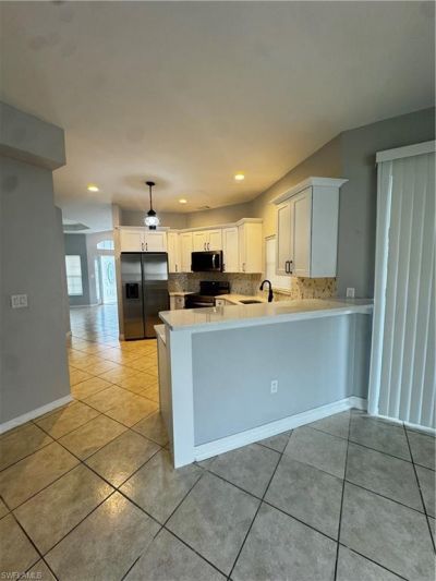 1709 Moore Ave , Lehigh Acres, FL 33972 Photo