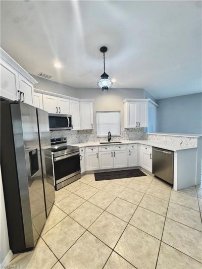 1709 Moore Ave , Lehigh Acres, FL 33972 Photo