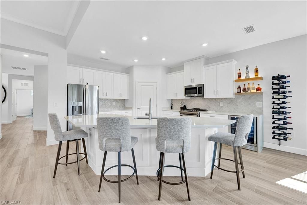 16893 Fairgrove Way, Unit 201, Naples, FL 34110 Photo
