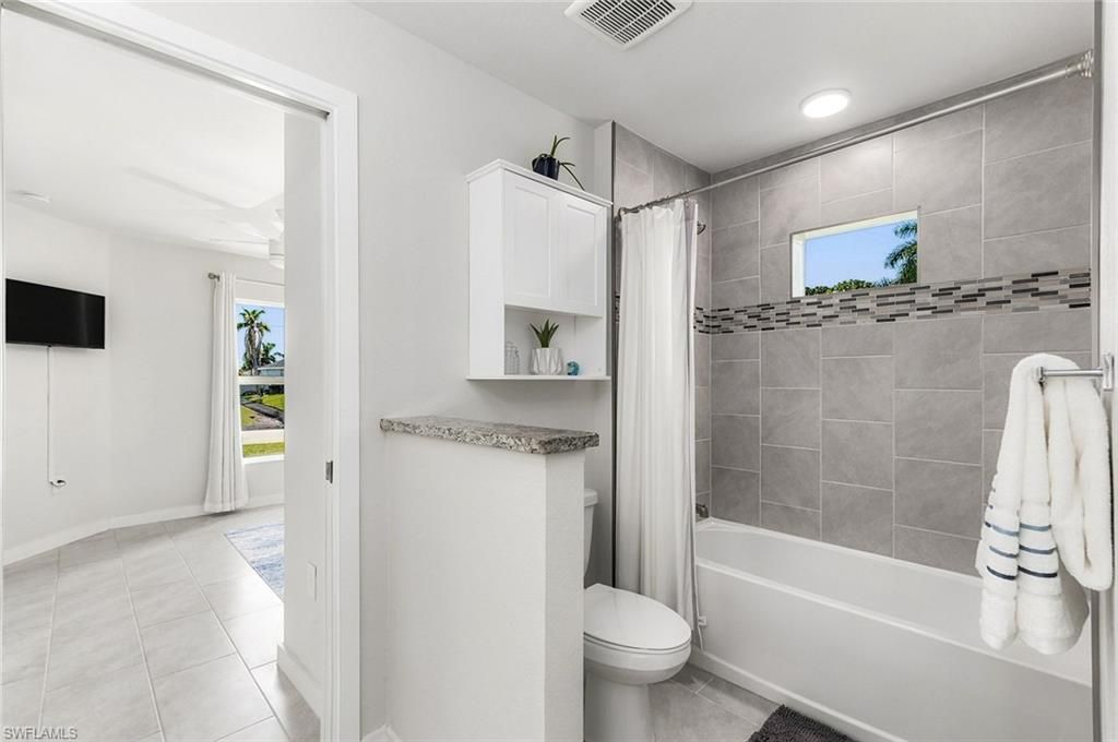 1409 NE 43rd Ter, Cape Coral, FL 33909 Photo