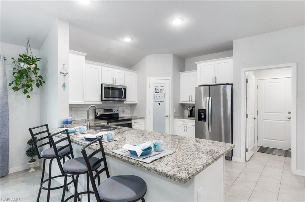 1409 NE 43rd Ter, Cape Coral, FL 33909 Photo
