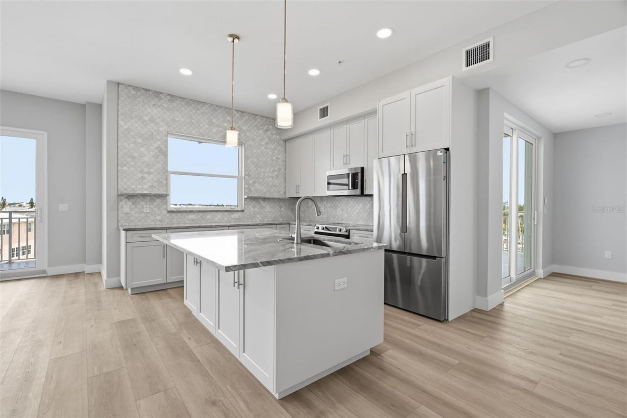 13655 Gulf Boulevard, Unit 401, Madeira Beach, FL 33708 Photo