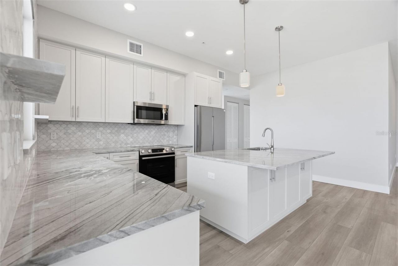 13655 Gulf Boulevard, Unit 401, Madeira Beach, FL 33708 Photo